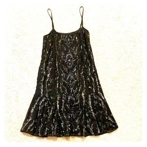 Black cocktail dress by Needle & Thread